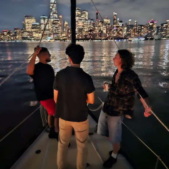 a group of people that are standing in the water