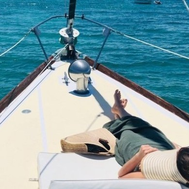 a man in a boat on a body of water