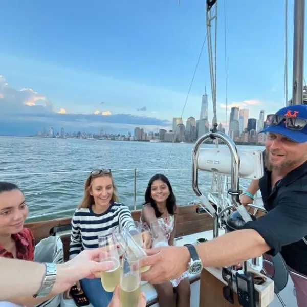 a group of people in a boat on a body of water