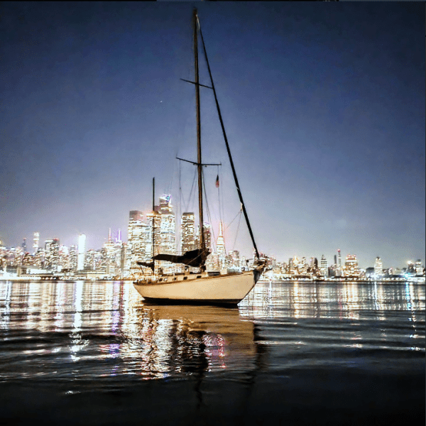 a boat is docked next to a body of water