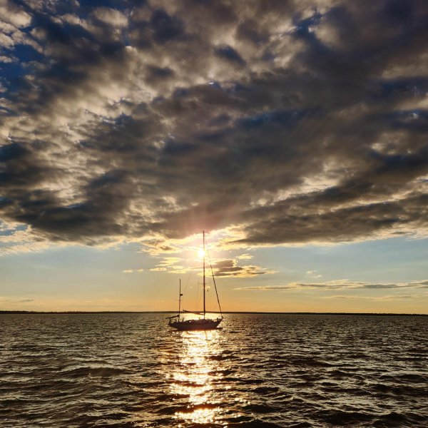 a sunset over a body of water