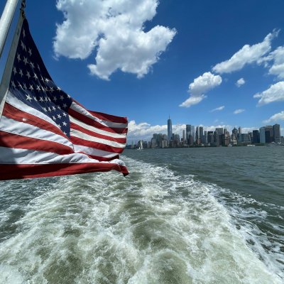 a man riding a wave on top of a body of water
