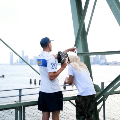 a man standing on a bridge