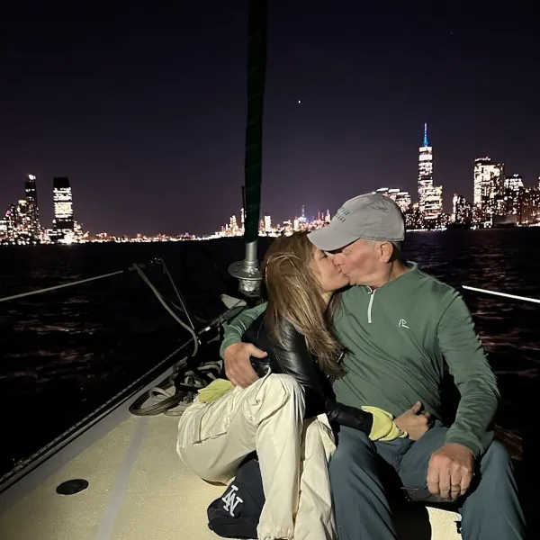 a man holding a snow board