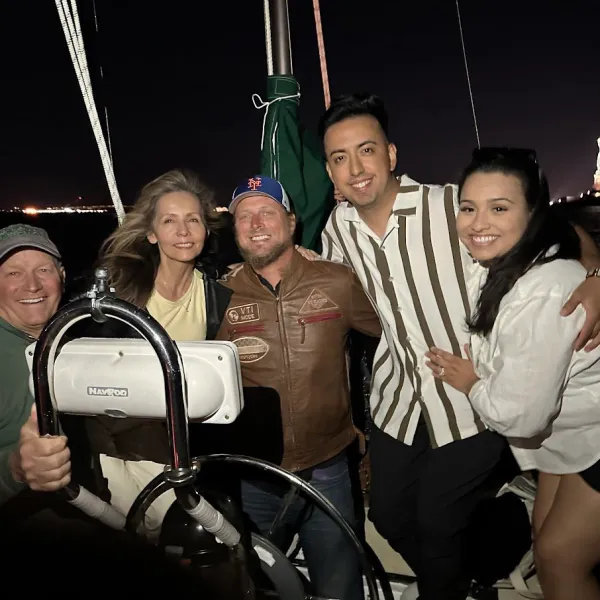 a group of people posing for the camera