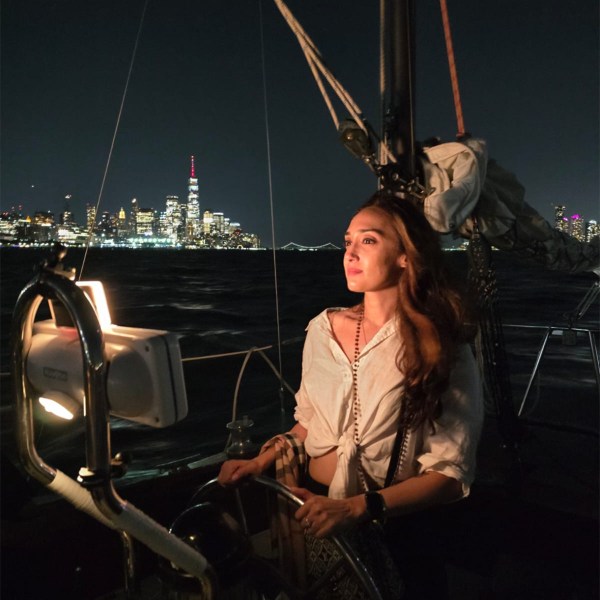 a person standing in front of a boat