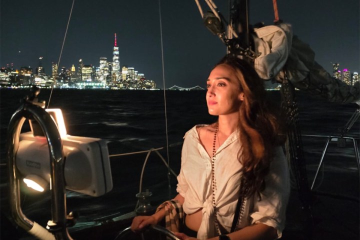 a person standing in front of a boat