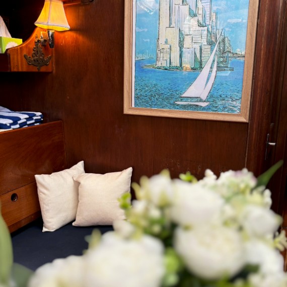 a room that has a sign on a wooden table